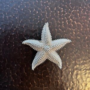 VINTAGE- MONET Silver colored Starfish Brooch
